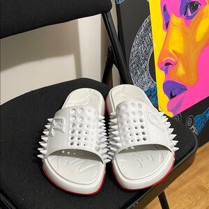 Red bottom Christian louboutin slides